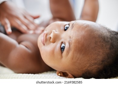 Time For A Six Month Check Up. Shot Of A Little Baby Getting A Checkup By A Doctor.