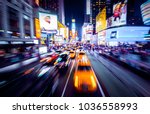 Time Square - New York in movement. Shot of cars in movement with motion blur.