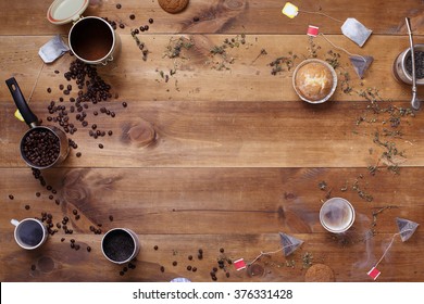 Time Of Tea Break On The Table Top View. Brown Wooden Table With Cup.