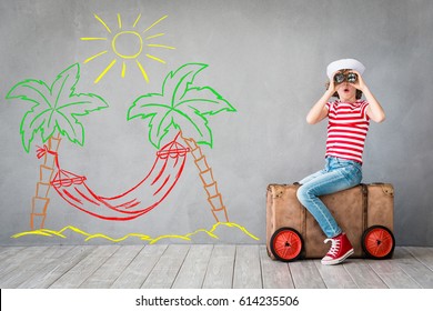 Time To Travel! Child Pretend To Be Sailor. Kid Having Fun At Home. Summer Vacation And Adventure Concept