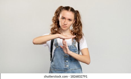 Time Up. School Protest. Confident Student Girl Showing T Gesture Asking For Break Isolated On Light Copy Space Background. Pause Sign.