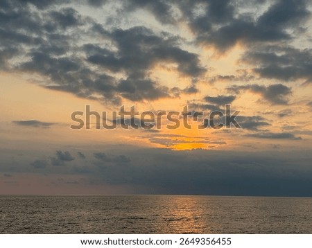the time when the sun descends below the horizon in the evening, marking the end of the day