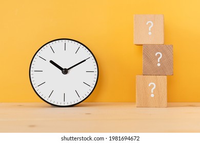 Time; Wooden Blocks With Question Mark And A Clock.