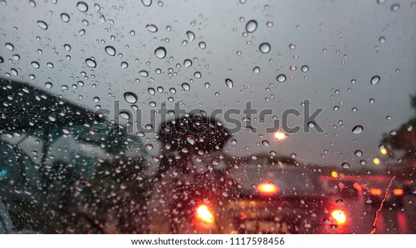 The time your car stuck in the jammed\
while raining coming down touch to your windshield car. Vision will\
blur caused rain soaked your windshield\
car