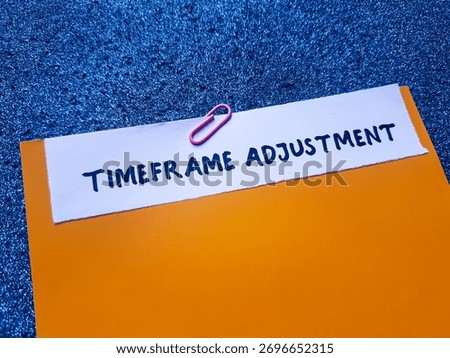 Timeframe adjustment writting on table background.