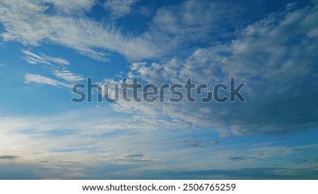 Timelapse. Intense dramatic panoramic sunset. Abstract different shades clouds at sunset sky background.