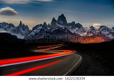 A timelapse shot of car lights in Fitz Roy Mountains in Argentina