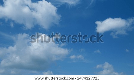 Similar – Image, Stock Photo Ethereal clouds flow over the serene hills of Fuerteventura as the day gently breaks