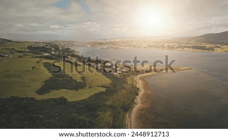 Timelapse of sun sea coast aerial. Rural greenn valley at old european town cityscape. Urban streets with old buildings. Roads with cars at shore. Sunny seascape with yachts. Nobody nature landscape
