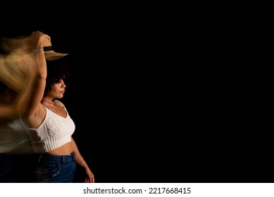 Time-lapse View Of Woman Moving A Hat. Long Exposure, Motion Blur. Happy Woman. Salvador, Brazil.