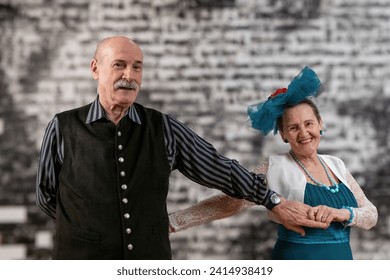 Timeless elegance and shared joy of a senior couple gracefully dancing, celebrating the beauty of love, connection, and the art of ballroom dance - Powered by Shutterstock