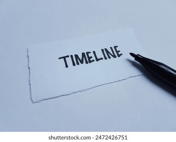 Timeline writting on table background.