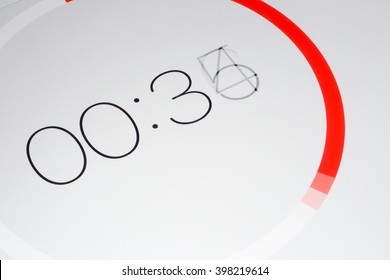 Timer 4. A digital timer, counting down, in closeup.