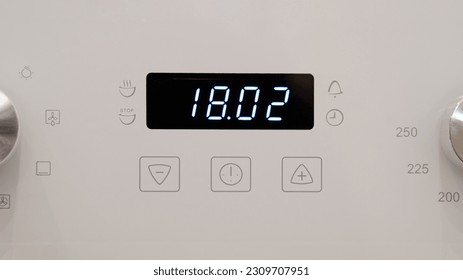 Timer clock on the kitchen oven. Cooking time, close-up