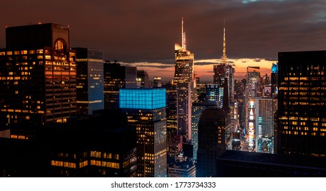 Times Square, Midtown Manhattan, New York Skyline At Night