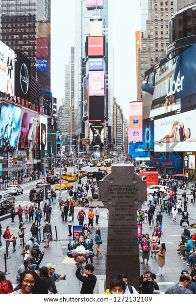 TIMES SQUARE, NEW YORK, USA\
- OCTOBER 8, 2018: urban scene with crowded times square in new\
york, usa