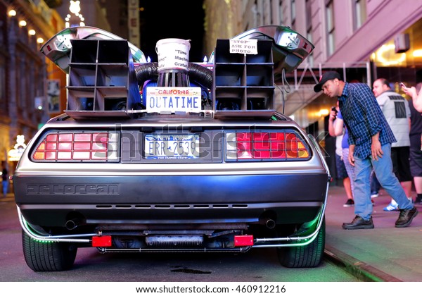 Timesquare, New\
York City - USA - JUNE 26, 2016: DMC De Lorean Back to the future\
car parking for show  under the ambient light at fifth avenue\
Timesquare, New York City -\
USA