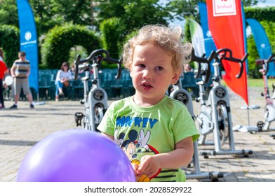 Timisoara, Romania - May 26, 2017: Kid playing with a baloon at a public event