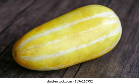 Timun Suri Or Cucurbitaceae On Wood Background. 