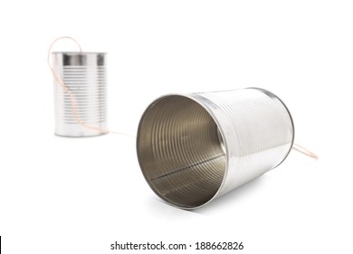Tin can phone isolated on white background connected by a gray string