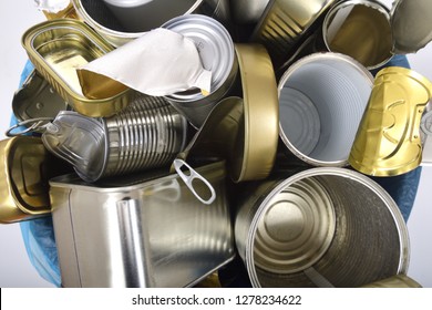 Tin Cans Inside A Garbage Can,top View