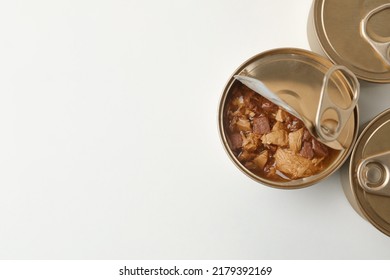 Tin Cans With Wet Cat Food On White Background, Top View. Space For Text