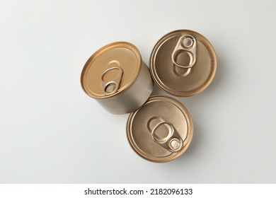 Tin Cans With Wet Cat Food On White Background, Top View