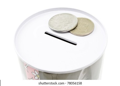 Tin Money Box With Coins Isolated On White