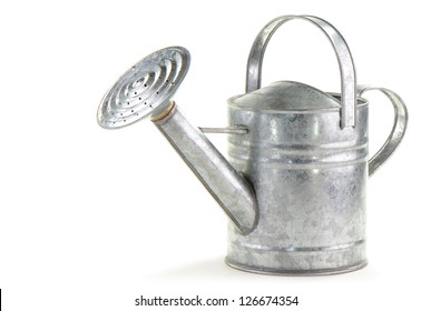 Tin watering can on white background with room for text