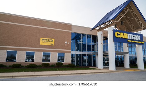 Tinley Park, IL, US – April 16th 2020: CarMax Parking Lot: CarMax Posted Sign Depicting “We”re Open By Appointment Only – Essential Business.” CarMax Seeking To Combat The Spread Of Covid-19.       