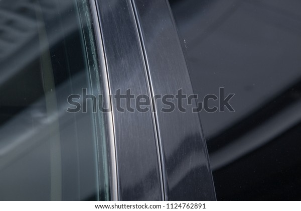 tinted
black car Windows that reflect the glass
ceiling