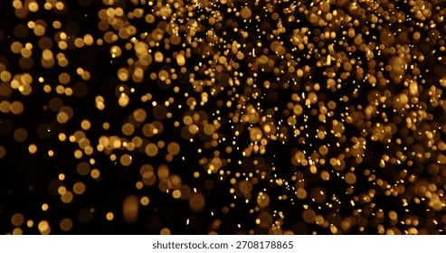Tiny dust particles fly randomly in the smoky air, an empty template of space for objects. Many particles of golden powder dust fall onto an empty black contrasting background in the center of