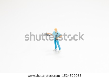 A tiny of figure theme broad cast on white board