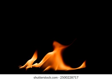 The tiny flames on the black background have an abstract power. - Powered by Shutterstock