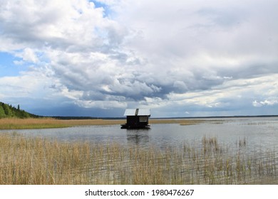 Tiny floating house on the lake
