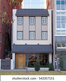 Tiny House Between Two Large Buildigs In Downtown Oklahoma City