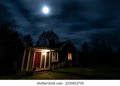 The tiny house in moonlight 