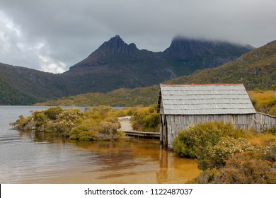 Tiny House On The Yellow Brown Lake Of The Cradle Mountain Region In Tasmania, Australia