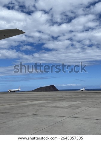 Tiny island next to an airdrome 