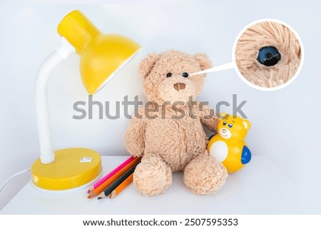 Tiny Miniature hidden surveillance camera embedded in teddy bear's eye for covert monitoring purposes, discreet surveillance in toy setups, covert operations, private surveillance
