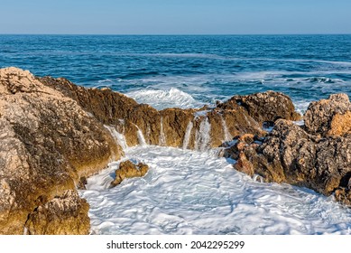 Tiny nudist beach between the rocks