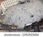 Tiny people walking in a square