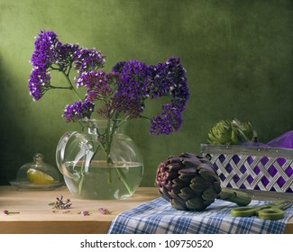 Tiny purple flowers and artichoke - Powered by Shutterstock