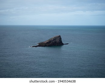 Tiny Small Islet Rock Stack Sticking Out Of Atlantic Ocean At Cap Frehel Lighthouse Peninsula Sea Cotes DArmor In Brittany France