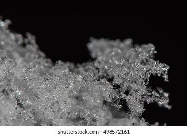 Tiny snow flakes close up