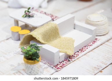 tiny sofa in a tiny room with accessories