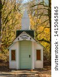 Tiny Upriver Chapel next to the Skagit River and a lush forest near Rockport, Washington, USA
