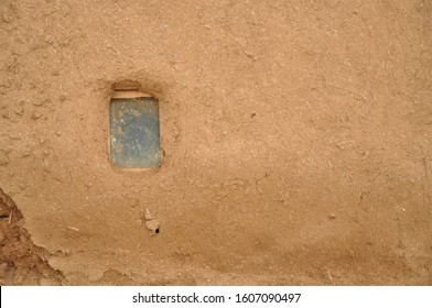 Tiny Window On Mudbrick Wall In Village Place