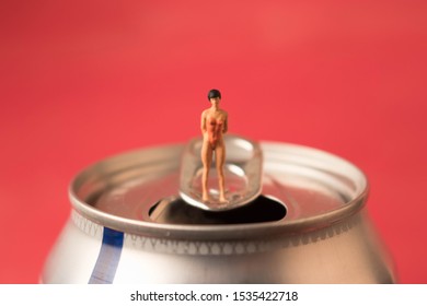 Tiny Woman On A Soda Can. Sugar Drink Or Cola Addiction.  Consumption Of Fizzy Drinks Are Bad For Diet And Health. Quitting Soda Habit Can Be Challenging. 