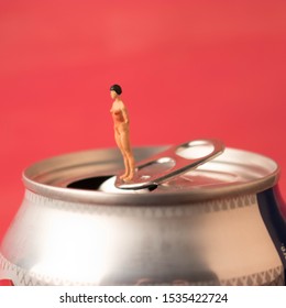 Tiny Woman On A Soda Can. Sugar Drink Or Cola Addiction.  Consumption Of Fizzy Drinks Are Bad For Diet And Health. Quitting Soda Habit Can Be Challenging. 